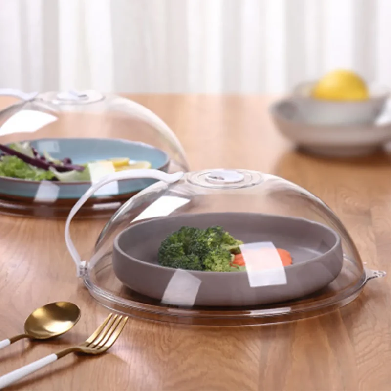 Cloche pour micro-ondes avec poignée